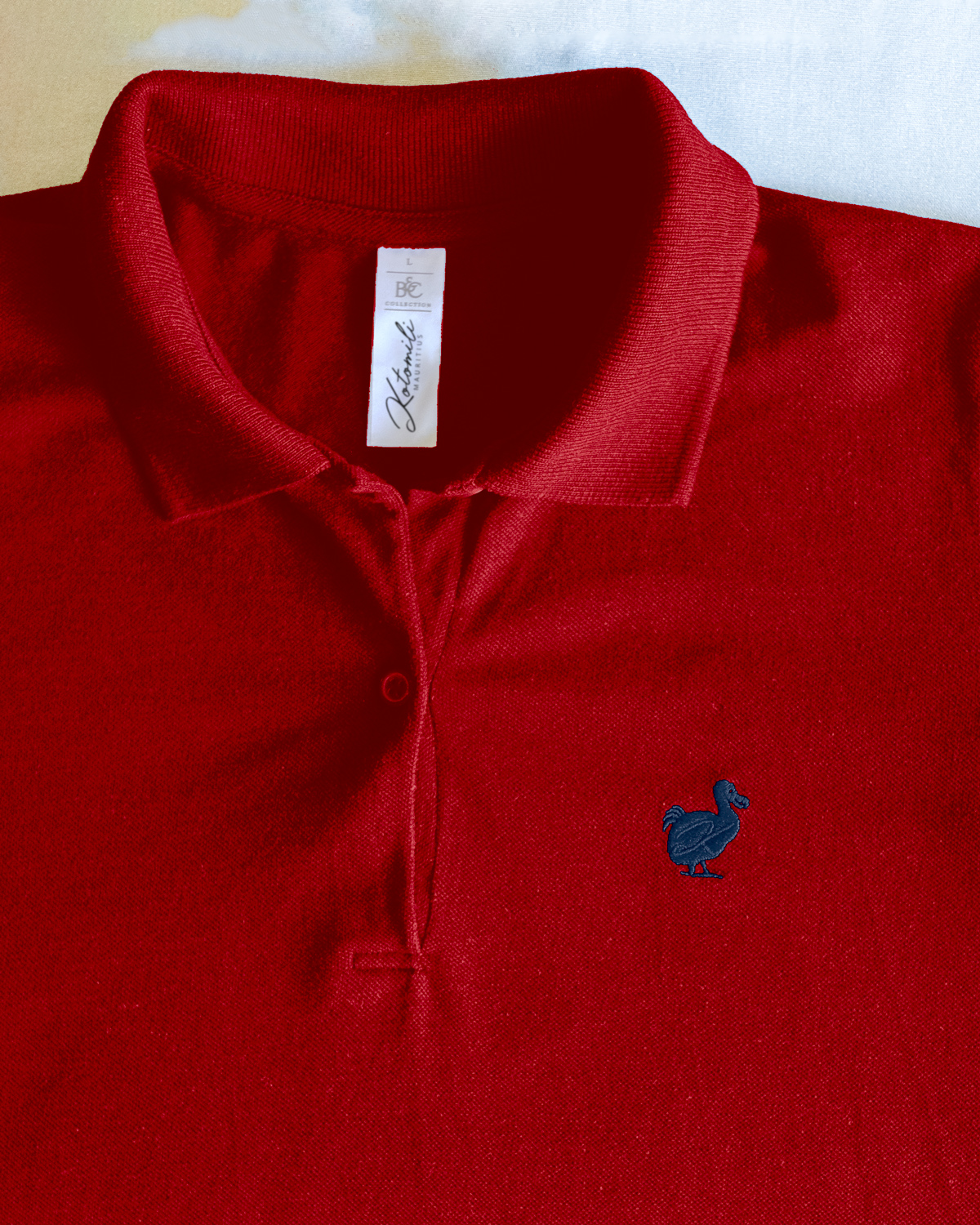 Kotomili-Mauritius-embroided-Dodo-Polo-colours-navy-on-red