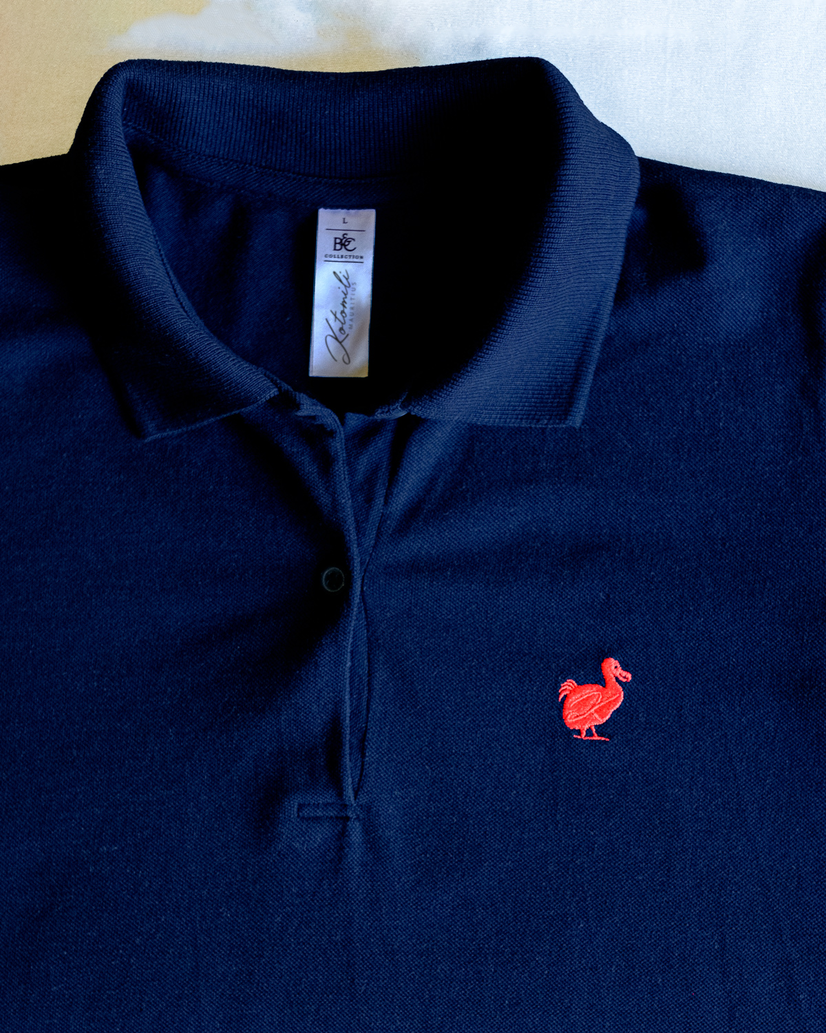 Kotomili-Mauritius-embroided-Dodo-Polo-colours-red-on-navy